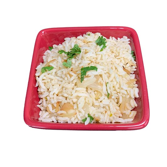 Buttery Mirchi Rice with caramelized onions and Super Mirchi Hot Sauce served in a bowl