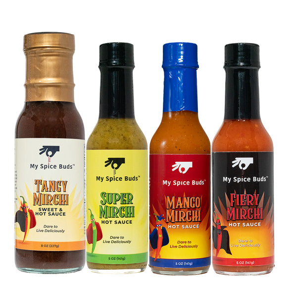 Four bottles of 'My Spice Buds' hot sauces with colorful labels on a white background