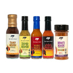 Five bottles and jars of My Spice Buds hot sauces and spice blends arranged on a white background, including Tangy Mirchi, Super Mirchi, Mango Mirchi, Fiery Mirchi, and Mom's Magic spice blend. 1