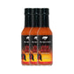 Three bottles of My Spice Buds Fiery Mirchi hot sauce on a white background