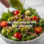 Bowl of salad with tomatoes and nuts, super mirchi being poured over it. 13